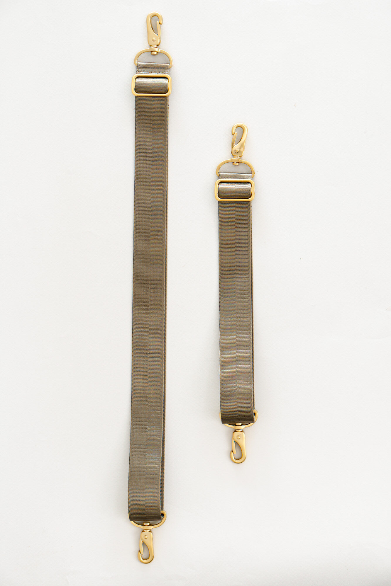Removable bag strap in taup with gold metal parts ind long and short